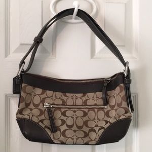 Coach leather and fabric shoulder bag w/ buckles